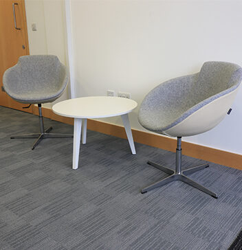 seating arrangement for office on grey carpet